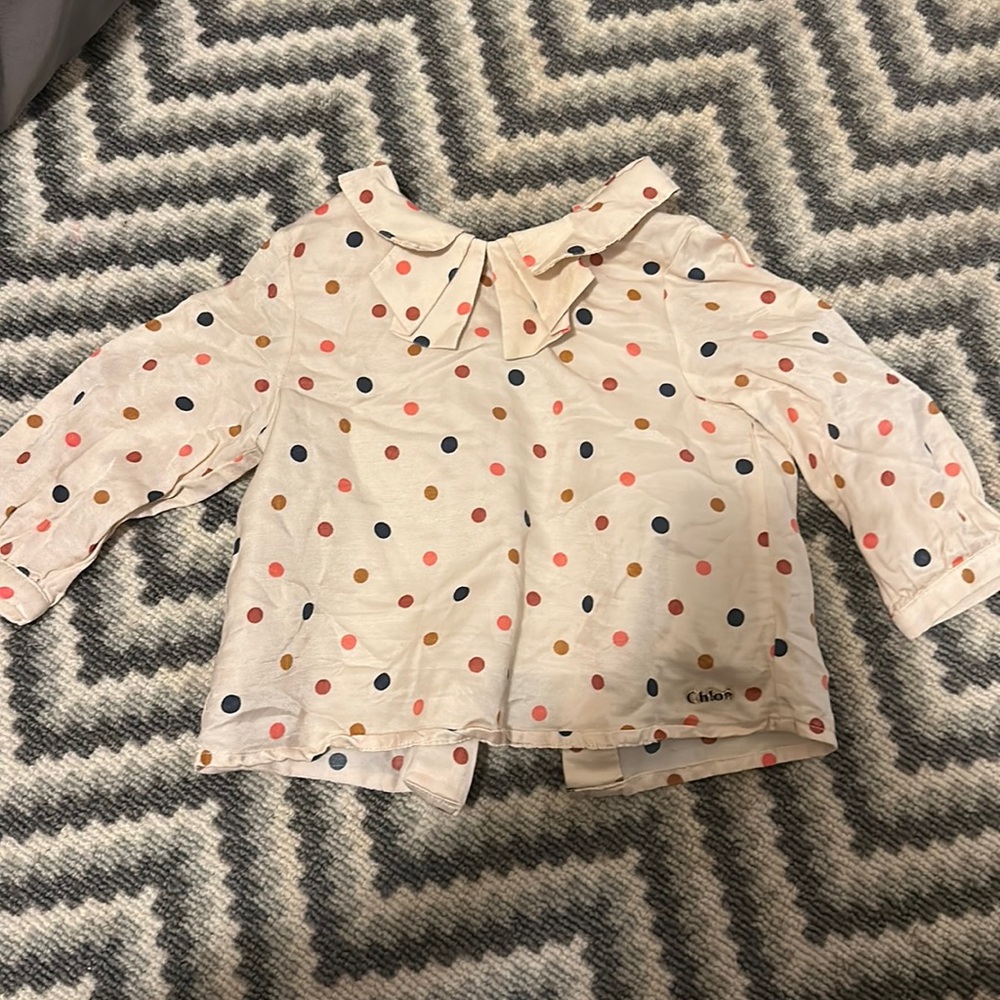 Baby Chloe 9 m top